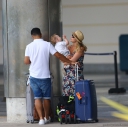 Kimberley_Walsh_and_Justin_Scott_looked_more_smitten_with_their_little_family_than_ever_as_they_headed_home_from_their_honeymoon_in_Barbados_12_02_16_281929.jpg
