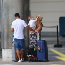 Kimberley_Walsh_and_Justin_Scott_looked_more_smitten_with_their_little_family_than_ever_as_they_headed_home_from_their_honeymoon_in_Barbados_12_02_16_282129.jpg