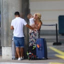 Kimberley_Walsh_and_Justin_Scott_looked_more_smitten_with_their_little_family_than_ever_as_they_headed_home_from_their_honeymoon_in_Barbados_12_02_16_282229.jpg