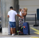Kimberley_Walsh_and_Justin_Scott_looked_more_smitten_with_their_little_family_than_ever_as_they_headed_home_from_their_honeymoon_in_Barbados_12_02_16_282329.jpg