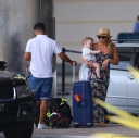 Kimberley_Walsh_and_Justin_Scott_looked_more_smitten_with_their_little_family_than_ever_as_they_headed_home_from_their_honeymoon_in_Barbados_12_02_16_283129.jpg