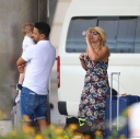 Kimberley_Walsh_and_Justin_Scott_looked_more_smitten_with_their_little_family_than_ever_as_they_headed_home_from_their_honeymoon_in_Barbados_12_02_16_283829.jpg