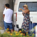Kimberley_Walsh_and_Justin_Scott_looked_more_smitten_with_their_little_family_than_ever_as_they_headed_home_from_their_honeymoon_in_Barbados_12_02_16_283929.jpg