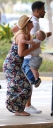 Kimberley_Walsh_and_Justin_Scott_looked_more_smitten_with_their_little_family_than_ever_as_they_headed_home_from_their_honeymoon_in_Barbados_12_02_16_284229.jpg