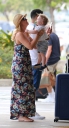 Kimberley_Walsh_and_Justin_Scott_looked_more_smitten_with_their_little_family_than_ever_as_they_headed_home_from_their_honeymoon_in_Barbados_12_02_16_284329.jpg