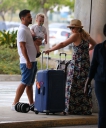 Kimberley_Walsh_and_Justin_Scott_looked_more_smitten_with_their_little_family_than_ever_as_they_headed_home_from_their_honeymoon_in_Barbados_12_02_16_284629.jpg