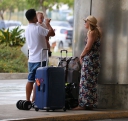 Kimberley_Walsh_and_Justin_Scott_looked_more_smitten_with_their_little_family_than_ever_as_they_headed_home_from_their_honeymoon_in_Barbados_12_02_16_284829.jpg