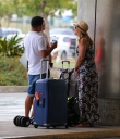 Kimberley_Walsh_and_Justin_Scott_looked_more_smitten_with_their_little_family_than_ever_as_they_headed_home_from_their_honeymoon_in_Barbados_12_02_16_284929.jpg