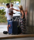 Kimberley_Walsh_and_Justin_Scott_looked_more_smitten_with_their_little_family_than_ever_as_they_headed_home_from_their_honeymoon_in_Barbados_12_02_16_285129.jpg