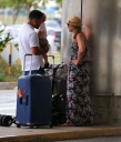 Kimberley_Walsh_and_Justin_Scott_looked_more_smitten_with_their_little_family_than_ever_as_they_headed_home_from_their_honeymoon_in_Barbados_12_02_16_285229.jpg
