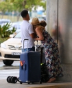 Kimberley_Walsh_and_Justin_Scott_looked_more_smitten_with_their_little_family_than_ever_as_they_headed_home_from_their_honeymoon_in_Barbados_12_02_16_285629.jpg