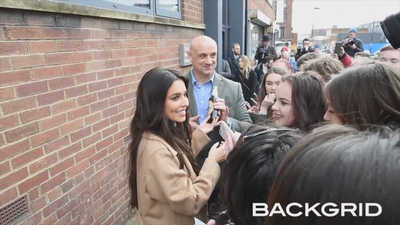 Cheryl_is_gifted_a_bottle_of_Newcastle_Brown_by_fan21_mp40035.jpg