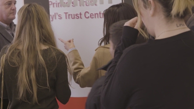 Priceless_reaction_as_Cheryl_surprises_young_person_live_on_stage_in_Newcastle_mp40017.jpg