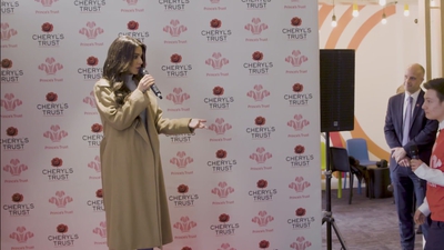 Priceless_reaction_as_Cheryl_surprises_young_person_live_on_stage_in_Newcastle_mp40028.jpg