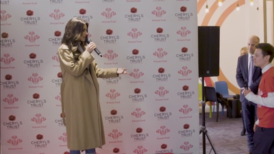 Priceless_reaction_as_Cheryl_surprises_young_person_live_on_stage_in_Newcastle_mp40029.jpg