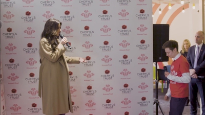 Priceless_reaction_as_Cheryl_surprises_young_person_live_on_stage_in_Newcastle_mp40031.jpg