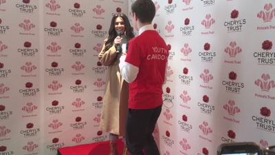 Priceless_reaction_as_Cheryl_surprises_young_person_live_on_stage_in_Newcastle_mp40036.jpg