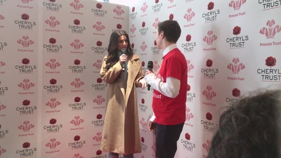 Priceless_reaction_as_Cheryl_surprises_young_person_live_on_stage_in_Newcastle_mp40050.jpg