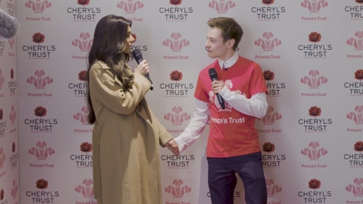 Priceless_reaction_as_Cheryl_surprises_young_person_live_on_stage_in_Newcastle_mp40080.jpg
