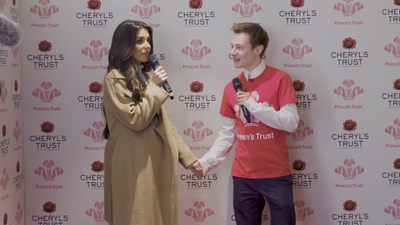 Priceless_reaction_as_Cheryl_surprises_young_person_live_on_stage_in_Newcastle_mp40083.jpg