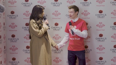 Priceless_reaction_as_Cheryl_surprises_young_person_live_on_stage_in_Newcastle_mp40085.jpg