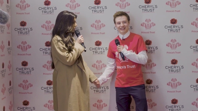 Priceless_reaction_as_Cheryl_surprises_young_person_live_on_stage_in_Newcastle_mp40087.jpg