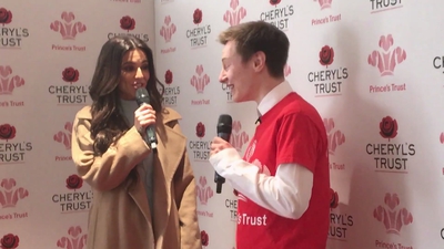 Priceless_reaction_as_Cheryl_surprises_young_person_live_on_stage_in_Newcastle_mp40090.jpg