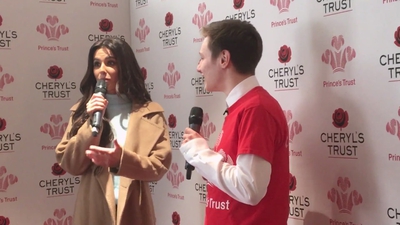 Priceless_reaction_as_Cheryl_surprises_young_person_live_on_stage_in_Newcastle_mp40095.jpg