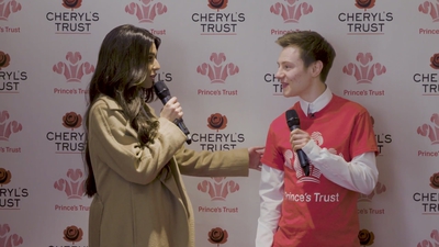Priceless_reaction_as_Cheryl_surprises_young_person_live_on_stage_in_Newcastle_mp40104.jpg