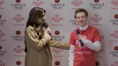 Priceless_reaction_as_Cheryl_surprises_young_person_live_on_stage_in_Newcastle_mp40117.jpg