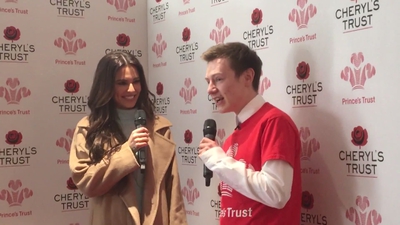 Priceless_reaction_as_Cheryl_surprises_young_person_live_on_stage_in_Newcastle_mp40122.jpg