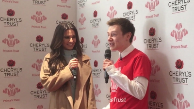 Priceless_reaction_as_Cheryl_surprises_young_person_live_on_stage_in_Newcastle_mp40124.jpg