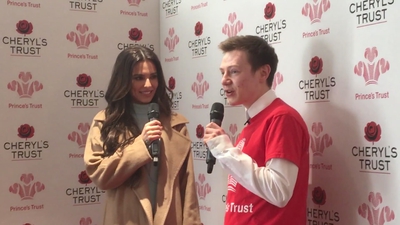 Priceless_reaction_as_Cheryl_surprises_young_person_live_on_stage_in_Newcastle_mp40127.jpg