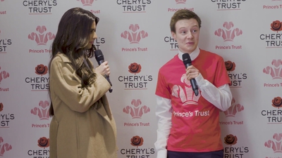 Priceless_reaction_as_Cheryl_surprises_young_person_live_on_stage_in_Newcastle_mp40131.jpg