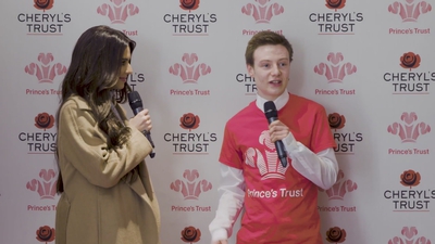 Priceless_reaction_as_Cheryl_surprises_young_person_live_on_stage_in_Newcastle_mp40141.jpg