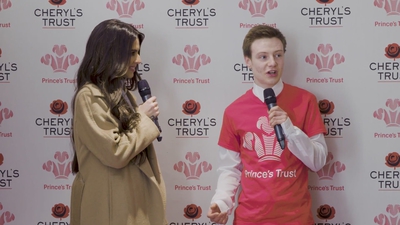 Priceless_reaction_as_Cheryl_surprises_young_person_live_on_stage_in_Newcastle_mp40153.jpg