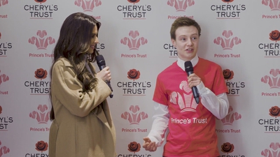 Priceless_reaction_as_Cheryl_surprises_young_person_live_on_stage_in_Newcastle_mp40154.jpg