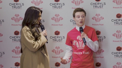 Priceless_reaction_as_Cheryl_surprises_young_person_live_on_stage_in_Newcastle_mp40155.jpg