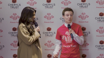 Priceless_reaction_as_Cheryl_surprises_young_person_live_on_stage_in_Newcastle_mp40160.jpg