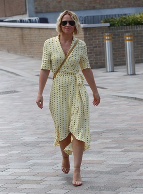Kimberley_Walsh_shows_stunning_figure_in_printed_dress_while_she_exits_Sunday_Brunch_TV_studios_in_London_01_09_19_281229.jpg