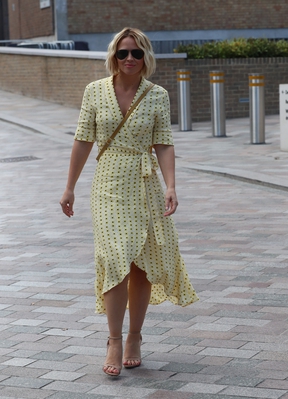 Kimberley_Walsh_shows_stunning_figure_in_printed_dress_while_she_exits_Sunday_Brunch_TV_studios_in_London_01_09_19_281429.jpg