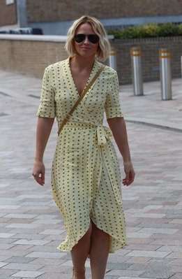 Kimberley_Walsh_shows_stunning_figure_in_printed_dress_while_she_exits_Sunday_Brunch_TV_studios_in_London_01_09_19_281929.jpg