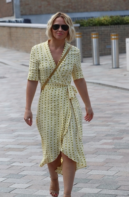 Kimberley_Walsh_shows_stunning_figure_in_printed_dress_while_she_exits_Sunday_Brunch_TV_studios_in_London_01_09_19_282029.jpg