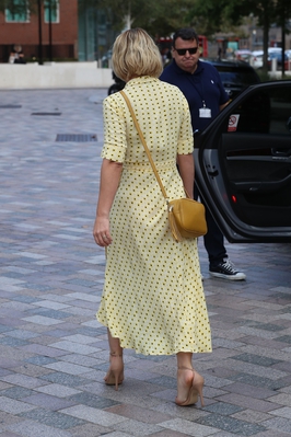Kimberley_Walsh_shows_stunning_figure_in_printed_dress_while_she_exits_Sunday_Brunch_TV_studios_in_London_01_09_19_282129.jpg