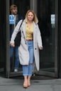 Kimberley_Walsh_Flashes_sensational_physique_in_gold_top_and_denim_exits_Radio_5_studio_in_London_14_03_20_281429.jpg