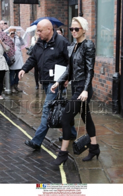 Girls_Aloud_check_out_of_their_Hotel_in_Leeds_150509_13.jpg
